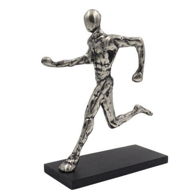 Soška běžce, kovová figurka s gravírováním