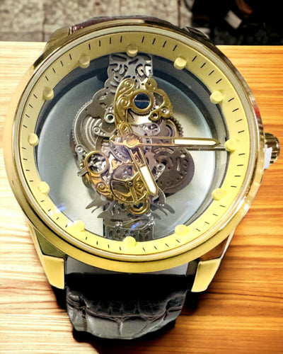 Pánské hodinky s průhledným mechanismem - Elegance a preciznost ve zlatém provedení